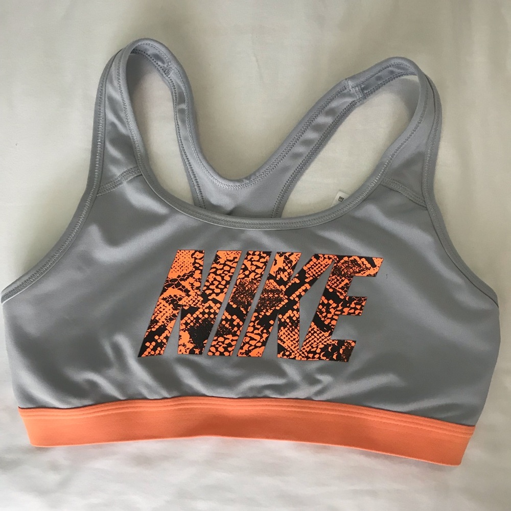Grey and orange Nike sports bra